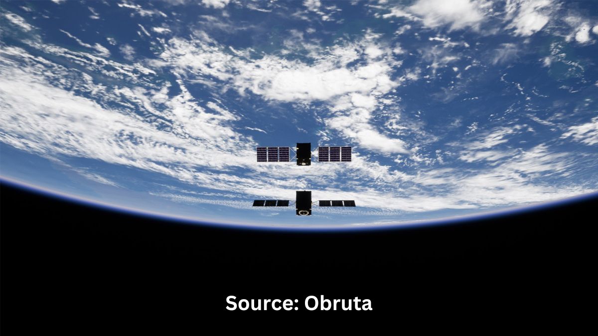 Two satellites are depicted in orbit above the Earth, positioned close together, as part of a docking simulation against the backdrop of the planet's curvature and cloud formations.