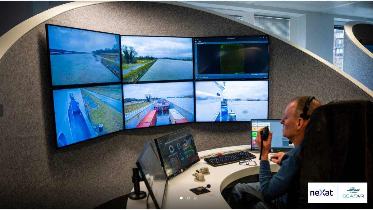 A person operates an unmanned remote ship navigation system from a control room, monitoring multiple screens displaying live video feeds of the ship's surroundings.