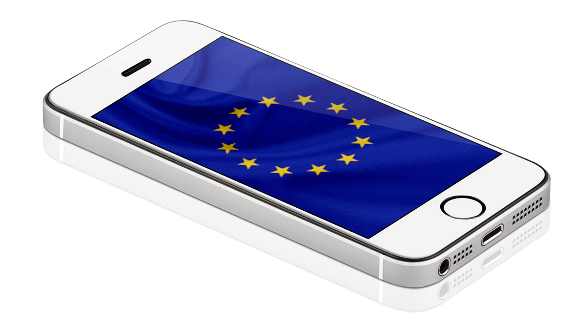 'A white smartphone displays the European Union flag on its screen, symbolizing EU digital connectivity and regulation.