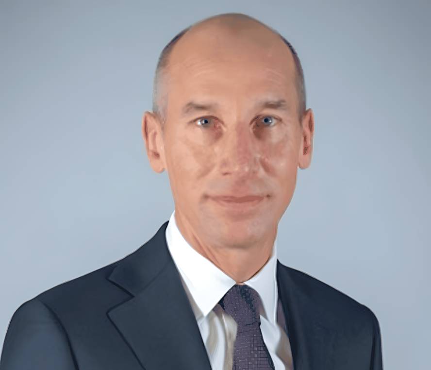 Professional portrait of Thomas Toepfer, CFO of Airbus, wearing a dark suit and tie against a neutral background.